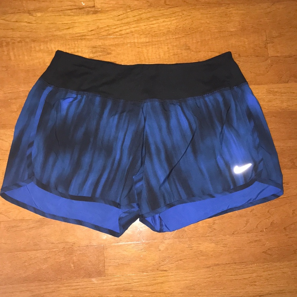 Blue and Black Nike running shorts